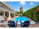 Stunning backyard with a clear view of the pool and patio seating at 8607 N Farview Dr, Scottsdale, AZ 85258