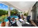 A refreshing covered patio featuring a view of the pool and comfortable outdoor seating at 8607 N Farview Dr, Scottsdale, AZ 85258