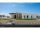 Modern home boasting a geometric design, manicured lawn, and desert landscaping at 10220 N 66Th St, Paradise Valley, AZ 85253