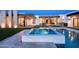 Backyard pool and hot tub, outdoor bar, and patio seating area in a modern luxury backyard design at 10220 N 66Th St, Paradise Valley, AZ 85253