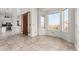 Light and airy foyer with tiled floors and a wooden front door at 11818 N Winchester Dr, Fountain Hills, AZ 85268