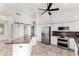 Modern kitchen with white cabinets, stainless appliances, and a central island at 11818 N Winchester Dr, Fountain Hills, AZ 85268