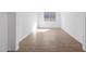 Bright flex space featuring wood-style floors and a large window at 1292 S 185Th Dr, Goodyear, AZ 85338