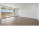 Open-concept living area with tile floors and sliding glass doors at 1292 S 185Th Dr, Goodyear, AZ 85338