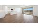 Open-concept kitchen and living area with tile floors and sliding glass doors at 1292 S 185Th Dr, Goodyear, AZ 85338