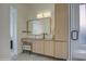 Modern bathroom vanity with stone countertop, vessel sink, and sleek fixtures at 14132 W Bent Tree S Cir, Litchfield Park, AZ 85340