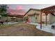 Outdoor living space with a pergola and a landscaped backyard at 16336 N 168Th Ave, Surprise, AZ 85388