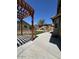 This is a backyard with a pergola, a built-in grill, and a concrete patio at 16336 N 168Th Ave, Surprise, AZ 85388