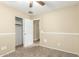 Carpeted bedroom showcasing a closet and neutral colored walls at 16336 N 168Th Ave, Surprise, AZ 85388