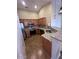 This is a kitchen featuring granite countertops, stainless steel appliances, and ample cabinet space at 16336 N 168Th Ave, Surprise, AZ 85388