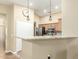 Bright kitchen featuring granite countertops, stainless steel appliances, pendant lighting and tiled flooring at 16336 N 168Th Ave, Surprise, AZ 85388