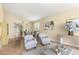 This airy living room features neutral paint, modern furniture, and an open floor plan at 16336 N 168Th Ave, Surprise, AZ 85388