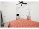 Cozy bedroom includes a double bed, closet, and connecting bath at 17816 W Oregon Ave, Litchfield Park, AZ 85340