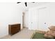 Bright bedroom featuring white walls, a contemporary dresser and a cozy teddy bear at 17816 W Oregon Ave, Litchfield Park, AZ 85340