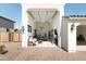 Well-equipped garage with brick-paved driveway, offering space for fitness, storage, and hobbies at 17816 W Oregon Ave, Litchfield Park, AZ 85340