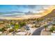 Pictureesque neighborhood street shows varied landscaping and houses nestled near a majestic mountain at 1955 E Greenway Rd, Phoenix, AZ 85022