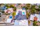 Aerial view of the modern home featuring a backyard pool and xeriscaped landscaping at 1955 E Greenway Rd, Phoenix, AZ 85022