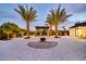Wide open backyard showcasing a gazebo, fire pit, and desert landscaping at 1955 E Greenway Rd, Phoenix, AZ 85022
