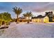 Wide open backyard featuring desert landscaping, a fire pit, and a modern gazebo at 1955 E Greenway Rd, Phoenix, AZ 85022