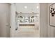 Modern bathroom with sleek fixtures, glass shower, and double vanity at 1955 E Greenway Rd, Phoenix, AZ 85022