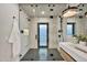 Modern bathroom featuring glass enclosed shower and vessel sink at 1955 E Greenway Rd, Phoenix, AZ 85022