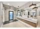 Contemporary bathroom featuring walk-in shower, vessel sink, and modern lighting at 1955 E Greenway Rd, Phoenix, AZ 85022