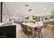 Open concept dining room and kitchen, perfect for entertaining guests at 1955 E Greenway Rd, Phoenix, AZ 85022