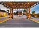 A view from inside the gazebo showing the modern landscaping and accent lighting at 1955 E Greenway Rd, Phoenix, AZ 85022