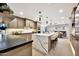 Spacious kitchen with an island, modern cabinets, and stainless steel appliances, perfect for Gathering gatherings at 1955 E Greenway Rd, Phoenix, AZ 85022