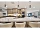 Beautiful kitchen island with pendant lighting, counter seating, and high-end finishes at 1955 E Greenway Rd, Phoenix, AZ 85022