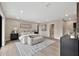 Inviting main bedroom with a sitting area, wood floors, and natural light at 1955 E Greenway Rd, Phoenix, AZ 85022