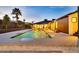 Modern backyard pool with water features and desert landscaping at 1955 E Greenway Rd, Phoenix, AZ 85022