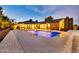 Gorgeous backyard pool with water features and desert landscaping at 1955 E Greenway Rd, Phoenix, AZ 85022