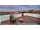 Rooftop deck with stylish seating offers panoramic views of the city skyline and mountains at 1955 E Greenway Rd, Phoenix, AZ 85022