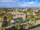 Aerial view of a home showcasing a backyard oasis with a pool, gazebo, palm trees, and outdoor seating at 21503 E Alyssa Ct, Queen Creek, AZ 85142