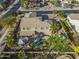 An elevated view reveals a meticulously landscaped backyard with a pool, a gazebo, and inviting seating areas at 21503 E Alyssa Ct, Queen Creek, AZ 85142