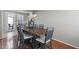 Charming dining room with hardwood floors and patio access at 21503 E Alyssa Ct, Queen Creek, AZ 85142