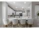 Bright kitchen featuring a center island, modern appliances, and seamless flow to the dining area at 21503 E Alyssa Ct, Queen Creek, AZ 85142