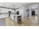Spacious kitchen features a large center island with wine storage and modern white cabinetry at 21503 E Alyssa Ct, Queen Creek, AZ 85142