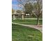 Scenic community park with a picnic area, basketball court, and lush landscaping at 21503 E Alyssa Ct, Queen Creek, AZ 85142