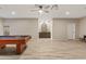 Finished basement featuring a pool table and ample space for entertainment at 2643 E Tamarisk St, Gilbert, AZ 85296
