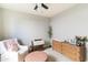 Bedroom with neutral tones, ceiling fan and area rug at 2819 N 28Th Pl, Phoenix, AZ 85008