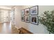 Hallway featuring wood-look tile floors and photo gallery at 2819 N 28Th Pl, Phoenix, AZ 85008