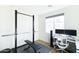 Home gym with workout equipment and desk area at 2819 N 28Th Pl, Phoenix, AZ 85008