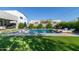 Backyard pool with luxurious sunbeds, privacy landscaping and a covered patio ideal for outdoor entertaining and relaxation at 2819 N 28Th Pl, Phoenix, AZ 85008