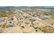 Wide aerial view of homes with ample land in a growing desert community at 28213 N Holly Rd, San Tan Valley, AZ 85143