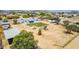 Aerial view of property with large backyard, mature trees and landscaping at 28213 N Holly Rd, San Tan Valley, AZ 85143