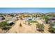 Aerial view of property with large backyard, mature trees and landscaping at 28213 N Holly Rd, San Tan Valley, AZ 85143