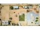This single-Gathering home features a large backyard, mature trees, and a shed at 28213 N Holly Rd, San Tan Valley, AZ 85143