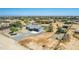 Aerial view of a single Gathering home featuring mature trees and a very long driveway at 28213 N Holly Rd, San Tan Valley, AZ 85143